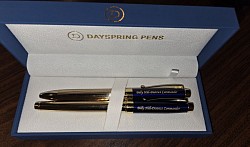 Gold pen set presented to 20th District Commander-Elect Billy Hill.